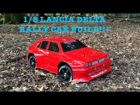 UNBOXING AND BUILDING A CUSTOM LANCIA DELTA 1/8 RC RALLY CAR!!!