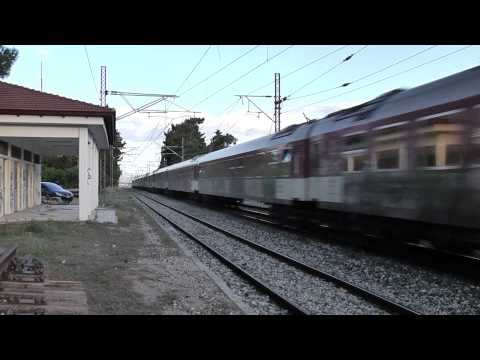 HD IC55 with double AEG dmu's passing Tanagra at speed