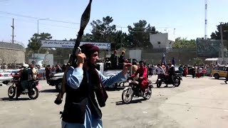 Taliban filmed moving people away from airport as 