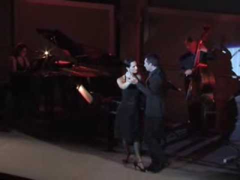  Roberto Herrera  and  Laura Legazcue  are  dancing  to  a  milonga  at  Sakura Tango Festival  in  2014