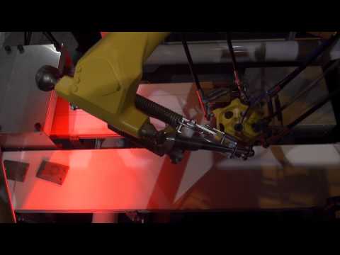 M-3iA/6S Picking Robot Picks Stamped Parts -- FANUC Robotics Industrial Automation