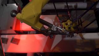 M-3iA/6S Picking Robot Picks Stamped Parts -- FANUC Robotics Industrial Automation