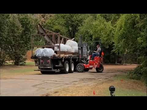 Unloading the metal for Larry's Garage