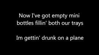 Drunk on a Plane Lyrics by Dierks Bentley