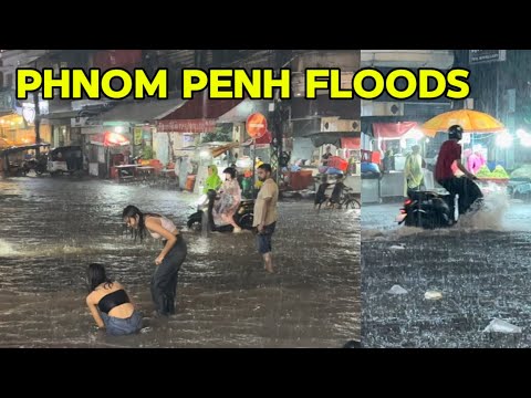 Heavy Rain Flash Flood in PHNOM PENH City  - Cambodia nightlife in the  Rain