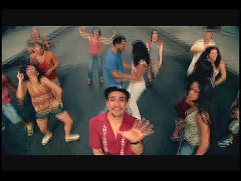 In the Heights TV spot collage with fire hydrant spray and piragua cart, signaling Latin grooves and street-life textures