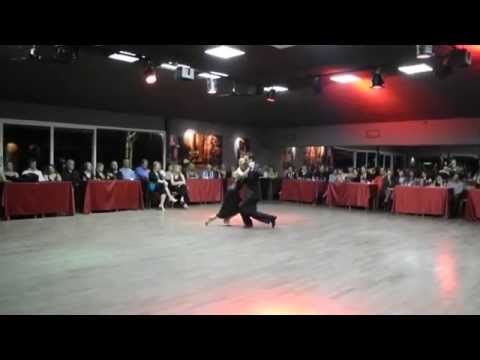  John Erban  and  Clarissa Sanchez  are  dancing  to  a  tango
