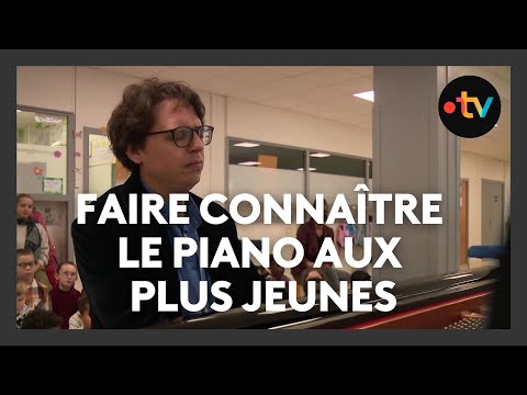 He goes to schools to introduce the piano to young people.