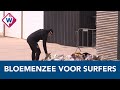 Den Haag rouwt bij bloemenzee op Scheveningen - OMROEP WEST