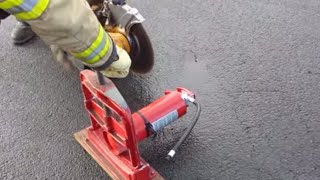 Cutting open a fire extinguisher with a K12