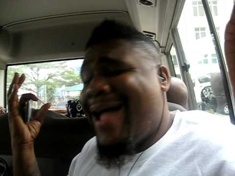 Big Mike Clemons singing on the bus in Legos Nigeria..