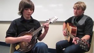Liam Purcell plays Grisman's "E.M.D."