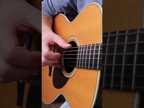 Sounds incredibly difficult, but it's actually really easy - fingerpicking