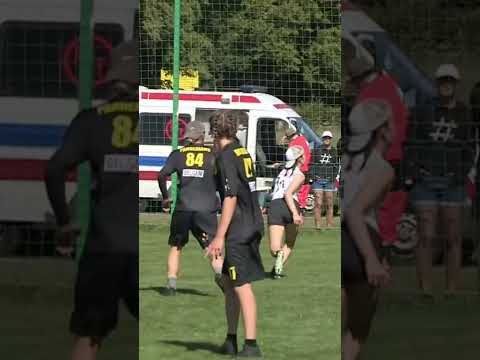 🎩 Who’s the figure in the bucket head flying into the stream?