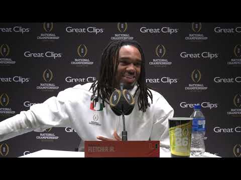 Miami Hurricanes RB Mark Fletcher and LB Wesley Bissainthe Jan. 17