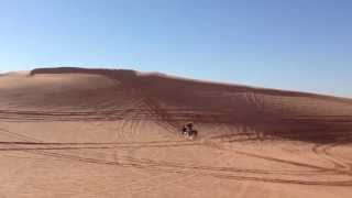 Canam Xmr climbing the dunes