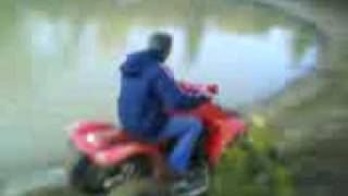 preview picture of video 'Four wheeler riding in pond'