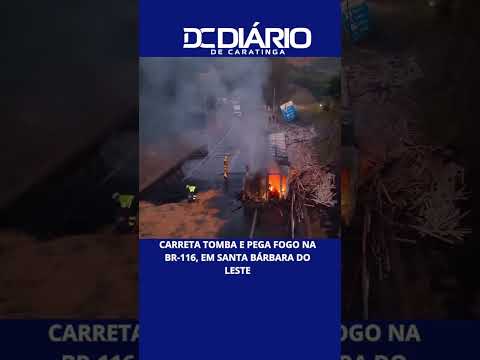 Carreta tomba e pega fogo na BR-116, em Santa Bárbara do Leste
