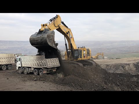 Caterpillar 6015B Excavator Loading Mercedes And MAN Trucks - Sotiriadis Mining Works