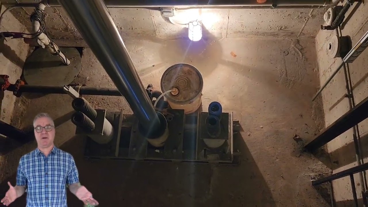 Well-Maintained Elevator Pit on a 25-Year-Old In-Ground Piston System