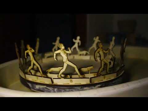 3d zoetrope. Animation of a walking man and a running cat