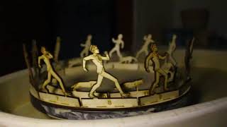 3d zoetrope. Animation of a walking man and a running cat