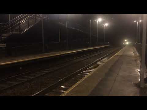 Class 144012 with a local service to Scunthorpe while a class 66786 passed through