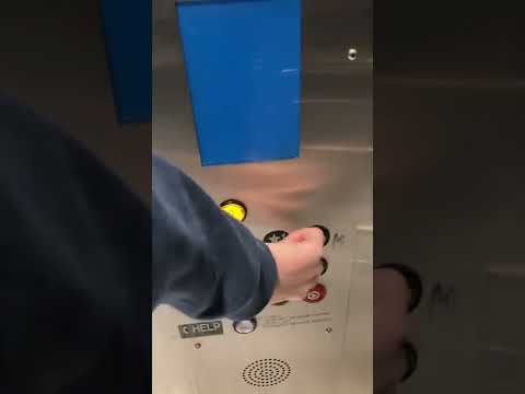 Montgomery A series elevator unknown slap on mod at DFW airport terminal E underground walkway