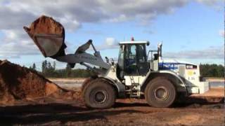 preview picture of video 'Cat 972G Loading Bell And Volvo Dumpers'