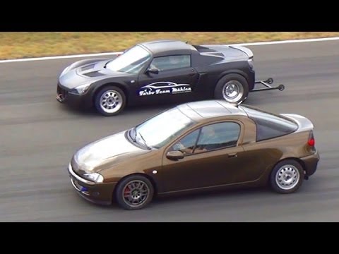 Thumbnail for Opel SPEEDSTER 2.0 Turbo vs TIGRA Turbo 1/4 Mile Drag Race Viertelmeile Rennen Acceleration Sound by Opel Tigra