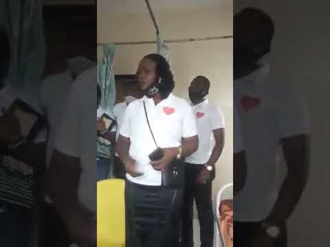 Members of our team giving words of encouragem to accident victims at the hospital.