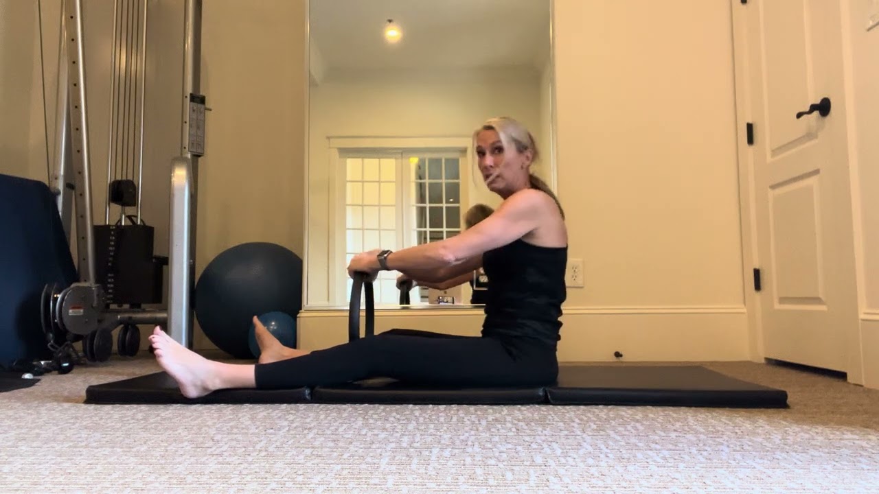 Spine Stretch Forward with Pilates Ring