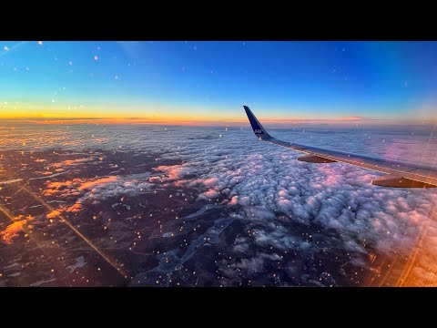 Bela aproximação e pouso do pôr do sol no Aeroporto de Arlanda, Estocolmo, Suécia - SAS Airbus A320 - 4K HDR