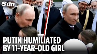 Moment Putin SQUIRMS during confrontation with child over Ukraine war