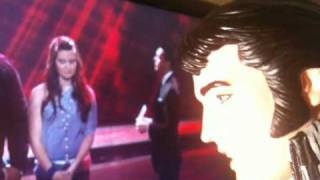 Plastic Elvis watches as Katie is eliminated in American Idol