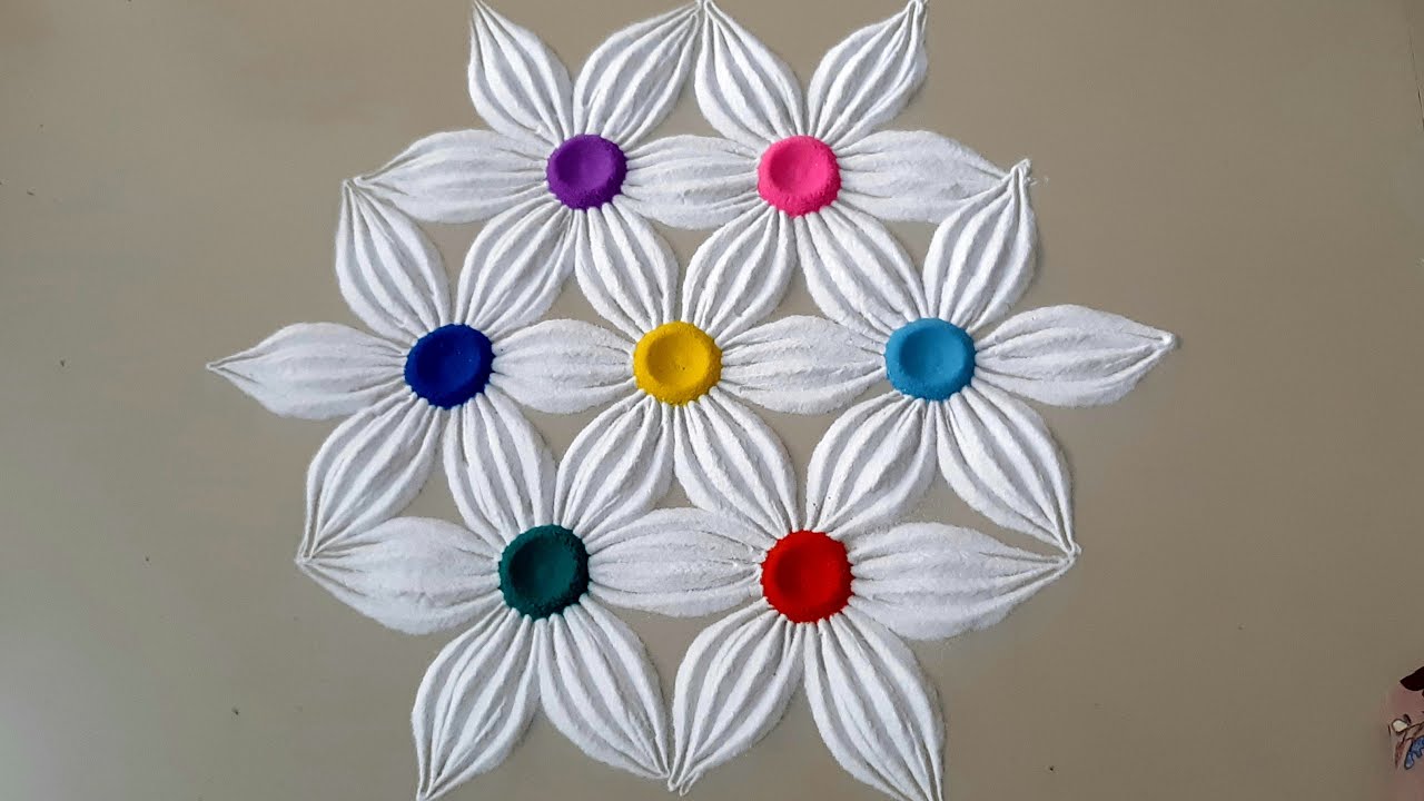 Indian traditional flower theme rangoli design by top rangolis