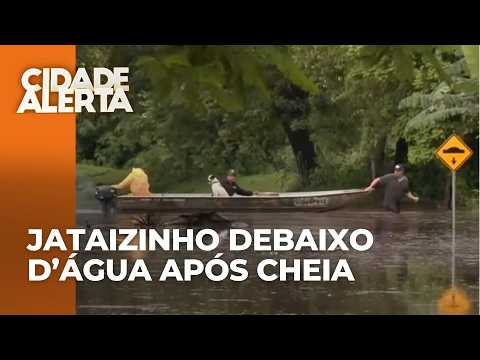 Enchentes após cheia do Tibagi transformam ruas em rios e famílias ilhadas são resgatadas de barco