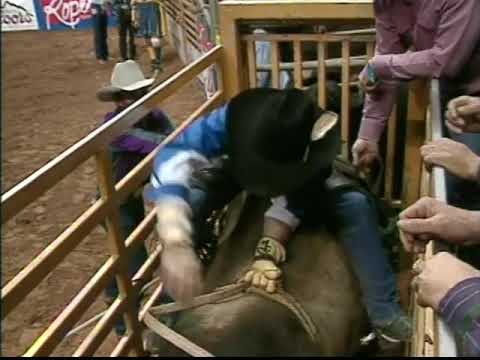Mark Cane rides Sammy Andrews bull RAWHIDE