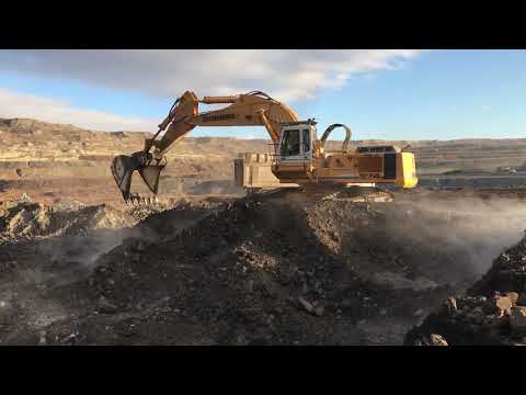 Liebherr 974 Excavator Loading Coal On Trucks