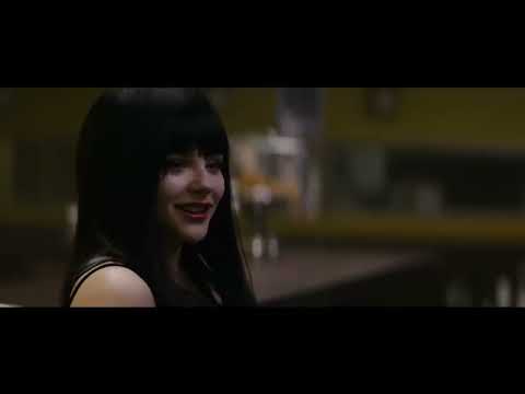 Trailer frame: close-up of McCall’s stopwatch—a visual metronome that the score echoes