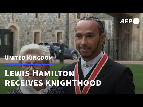 F1 driver Lewis Hamilton receives knighthood at Windsor Castle | AFP