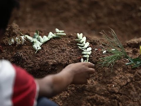 Click to Watch the Over 130 bodies discovered in horrific ISIS-created mass graves video