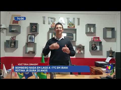 Bombeiro de Irani mergulha em lago gelado com frio abaixo de zero