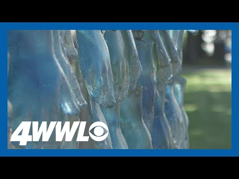 New Orleans artist puts together sculpture for murder...