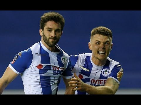 Man City's Quadruple quest ends in disgrace at Wigan