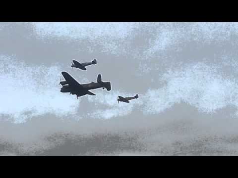 Avro Lancaster fly-by with 2 Spitfires