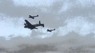 Avro Lancaster fly-by with 2 Spitfires