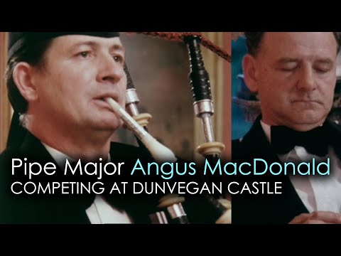 Pipe Major Angus MacDonald competing at Dunvegan Castle (Skye) & John D. Burgess on of the judges!