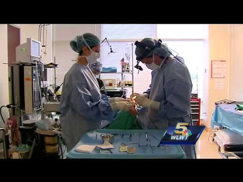 Plastic surgeon fixes domestic violence victim's scars for free