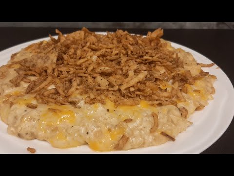 Funeral Potatoes! A cheesy and creamy hashbrown casserole made on the griddle